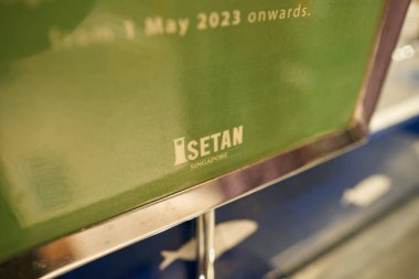 SINGAPORE - NOVEMBER 06, 2023: close up shot of Isetan sign as seen inside supermarket in Singapore. clipart