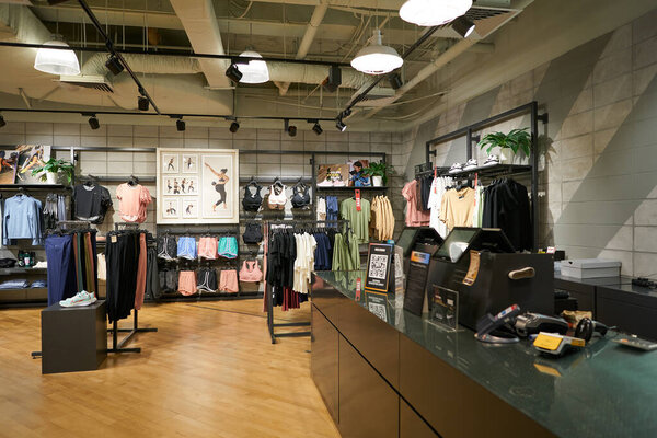 SINGAPORE - NOVEMBER 06, 2023: interior shot of Nike store inside Paragon shopping mall. Nike, Inc. is an American athletic footwear and apparel corporation.