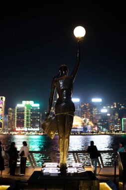 HONG KONG, CHINA - DECEMBER 07, 2023: Hong Kong Film Awards statue as seen at Victoria Harbour waterfront in Tsim Sha Tsui. clipart