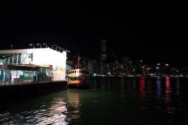 HONG KONG, CHINA - DECEMBER 06, 2023: a Star Ferry in Asia's World City livery at Tsim Sha Tsui, Hong Kong clipart