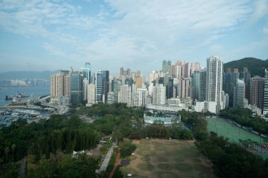 HONG KONG, CHINA - DECEMBER 06, 2023: view of Hong Kong as seen from The Park Lane Hong Kong - A Pullman Hotel. clipart