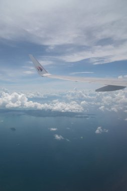 PHUKET, THAILAND - MAY 09, 2023: aerial view from Malaysia Airlines Boeing 737-800. clipart