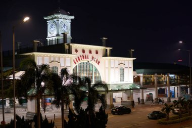 HONG KONG, CHINA - DECEMBER 05, 2023: southern facade of Star Ferry Pier at nighttime. clipart