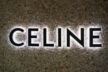 HONG KONG, CHINA - DECEMBER 05, 2023: close up shot of Celine sign as seen at a store in Harbour City. Harbour City is a shopping centre in Tsim Sha Tsui, Kowloon. clipart