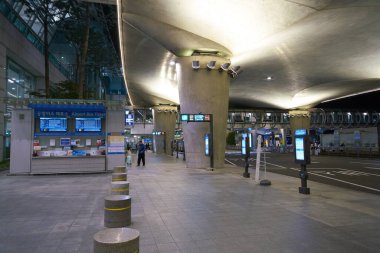 INCHEON, SOUTH KOREA - MAY 17, 2017: street level view of Incheon International Airport in the night. clipart