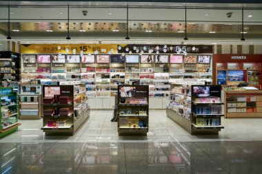 INCHEON, SOUTH KOREA - JUNE 04, 2017: perfumes displayed at duty free area in Incheon International Airport. clipart