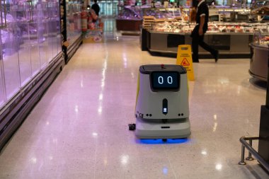 BANGKOK, THAILAND - 09 ARALIK 2023: Pudu Robotics CC1 Bangkok CentralWorld alışveriş merkezindeki Top s Food Hall, premium düzeyindeki süpermarket.