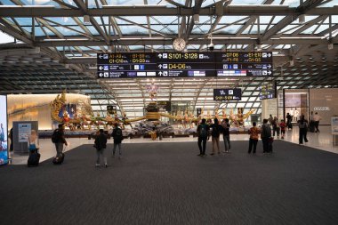 BANGKOK, THAILAND - OCTOBER 14, 2023: Churning of the Ocean of Milk as seen in Suvarnabhumi International Airport. clipart