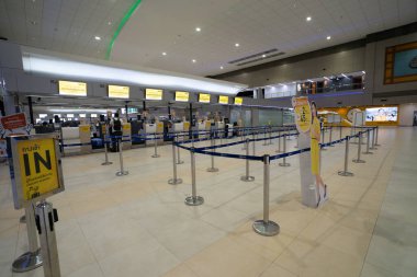 BANGKOK, THAILAND - OCTOBER 14, 2023: Nok Air check-in area at Don Mueang International Airport in Bangkok. clipart