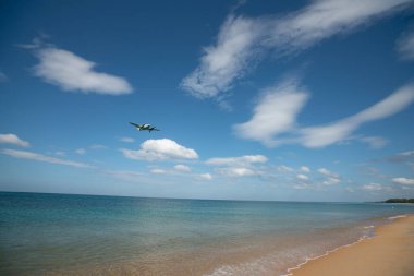 PHUKET, THAILAND - JANUARY 23, 2020: an aircraft landing at Phuket International Airport. clipart