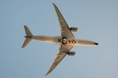 PHUKET, THAILAND - JANUARY 22, 2020: planform view of a Qatar Airways Airbus A350 take off from Phuket International Airport. clipart