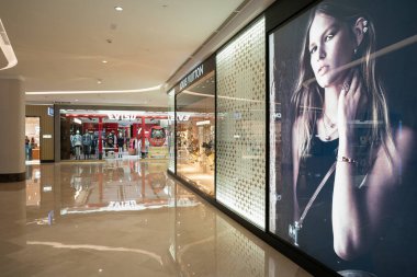 KUALA LUMPUR, MALAYSIA - MARCH 15, 2023: Louis Vuitton store at Suria KLCC shopping mall in Kuala Lumpur. clipart