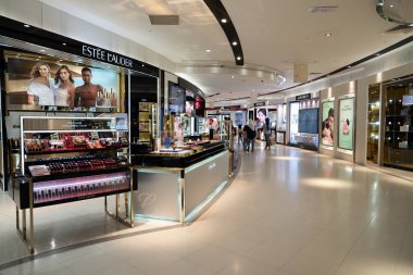 KUALA LUMPUR, MALAYSIA - MARCH 15, 2023: Estee Lauder products on display at Isetan departmental store in Kuala Lumpur. clipart