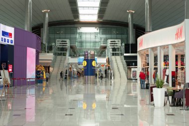 DUBAI, UAE - FEBRUARY 21, 2019: interior shot of Dubai International Airport. clipart