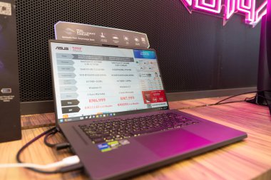 KUALA LUMPUR, MALAYSIA - NOVEMBER 09, 2023: ASUS ROG Zephyrus G16 on display in ASUS Concept Store at Mid Valley Megamall. clipart