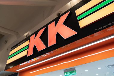 KUALA LUMPUR, MALAYSIA - NOVEMBER 14, 2023: close up shto of KK Supermart sign as seen in KLIA2. KK Supermart is a Malaysian convenience store chain. clipart