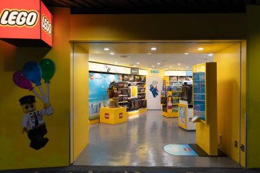 KUALA LUMPUR, MALAYSIA - NOVEMBER 15, 2023: entrance to Lego store in KLIA. Lego is a famous brand known for its creative building toys and construction sets. clipart