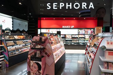 KUALA LUMPUR, MALAYSIA - DECEMBER 01, 2023: beauty products on display at Sephora store in Avenue K shopping mall. Sephora is a global retailer of personal care and beauty products clipart