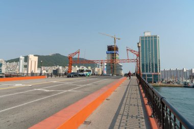 Busan, South Korea - May 28, 2017: a street-level view of Yeongdo Bridge at daytime. clipart