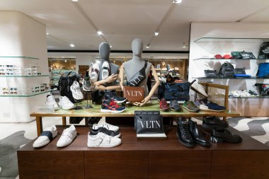 Hong Kong, China - February 02, 2019: footwear on display inside Lane Crawford in Harbour City shopping mall. clipart