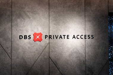 SINGAPORE - AUGUST 25, 2024: close-up shot of the DBS Private Access sign as seen in Terminal 3, Changi International Airport. clipart