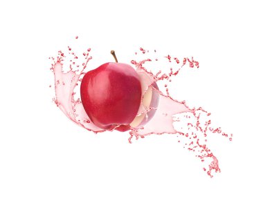 red apple cut with juice in flight