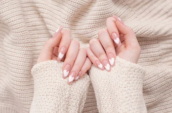 Female Hands Beautiful Long Nails Manicure Heart Pattern Winter Clothes — Stock Photo, Image