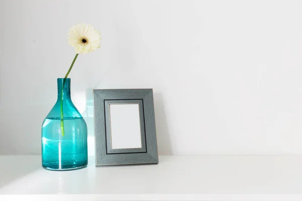 Gerber Glass Vase Wooden Frame White Wooden Wall — Stock Photo, Image