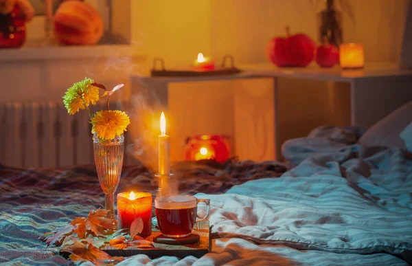 Cup Tea Chrysanthemum Vase Burning Candles Bedroom — Stock Photo, Image