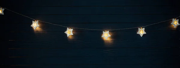 Christmas Lights Blue Wooden Background — Stock Photo, Image