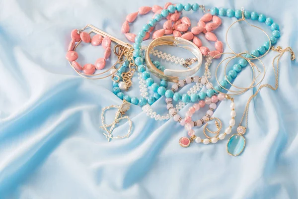 Different Women Jewelry Blue Fabric — Stock Photo, Image