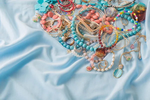 Different Women Jewelry Blue Fabric — Stock Photo, Image