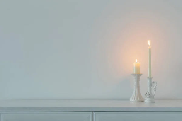 White Burning Candles Background White Wall — Stock Photo, Image