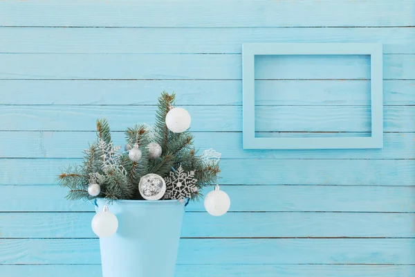 Christmas decor on blue wooden background