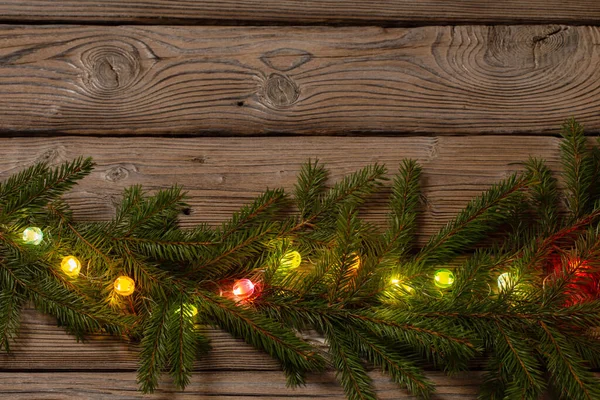 Πολύχρωμα Χριστούγεννα Φώτα Σκούρο Φόντο Ξύλινη — Φωτογραφία Αρχείου