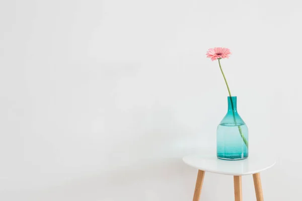 stock image pink gerber oin glass vase on white background