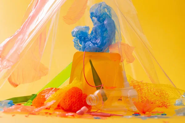 Plastic Trash Bright Yellow Background — Stock Photo, Image