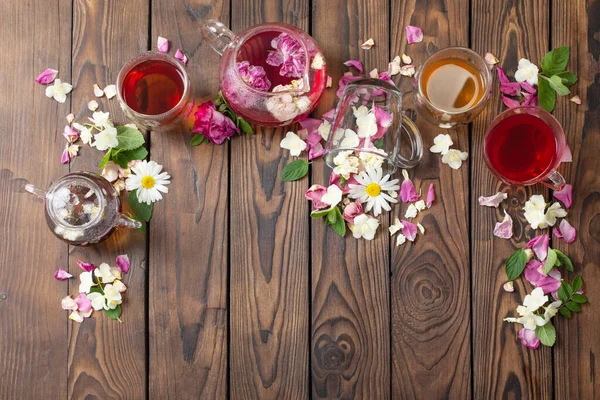Various Teas Herbs Flowers Dark Wooden Table Top View — Stock Photo, Image