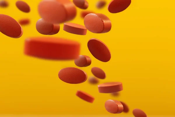 Літаючі Апельсинові Таблетки Жовтому Фоні — стокове фото