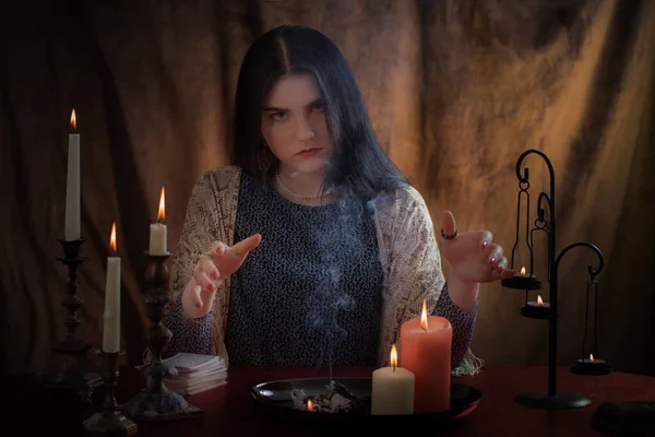 Young Witch Conjures Burning Candles Dark Background — Stock Photo, Image