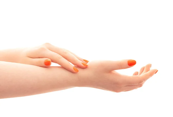 Vrouwelijke Handen Met Oranje Manicure Geïsoleerd Witte Achtergrond — Stockfoto