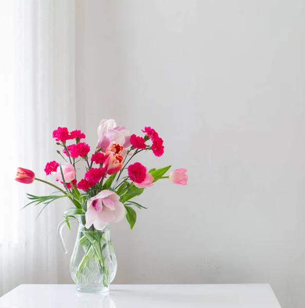Pink Spring Flowers Glass Jug White Background — Stock Photo, Image