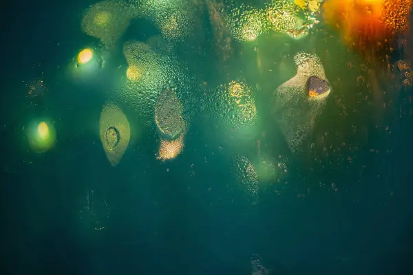 ライトが付いている抽象的な緑そして黄色の背景 — ストック写真