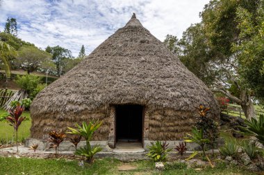 House of a Kanak traditional village in the Tinu Peninsula,  Noumea, Grande Terre Island, New Caledonia clipart