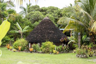 View of a traditional hut in Easo, Lifou Island, Loyalty Islands, New Caledonia, South Pacific  clipart