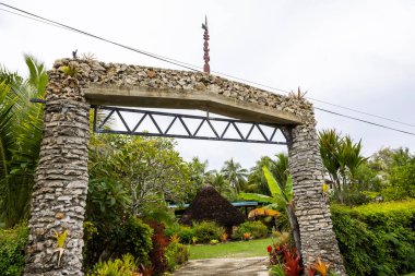 Arch entrance to a traditional hut in Easo, Lifou Island, Loyalty Islands, New Caledonia, South Pacific  clipart