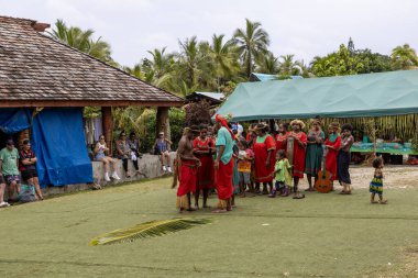 Local Kanak people performing a welcome dance and song at the Lifou Island cruise terminal clipart