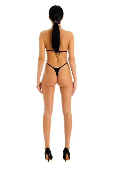 Baksidan Ung Kvinna Svart Bikini Isolerad Vit Bakgrund — Stockfoto