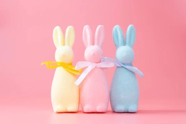 Pastel Colored Easter Bunny Decorations Lined Pink Background — Fotografia de Stock