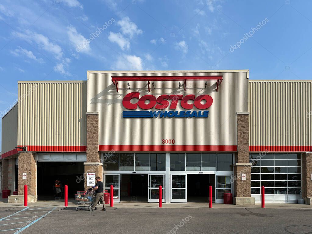 Novi, Michigan, USA - Aug 30, 2024 : Costco Wholesale Store front entrance. Costco Wholesale is an American multinational corporation which operates a chain of membership only big box retail store.